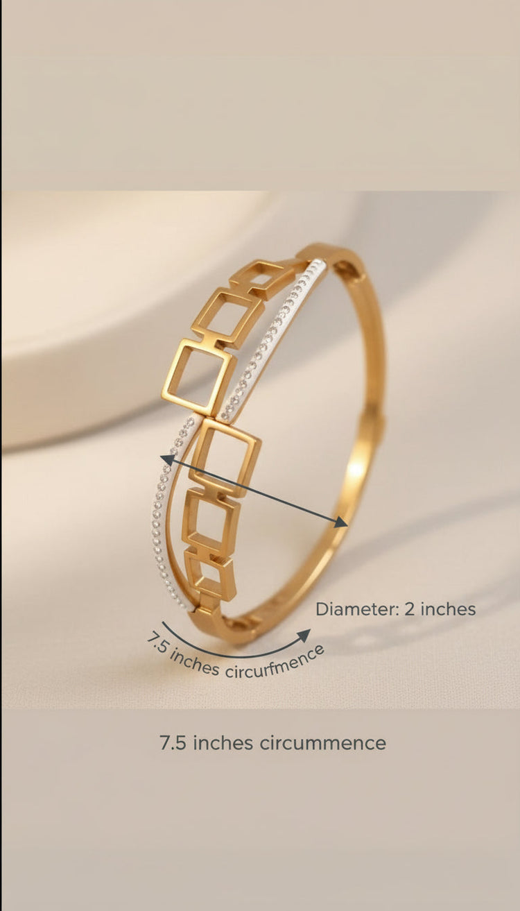 Gold bracelet with measurement details on a beige background