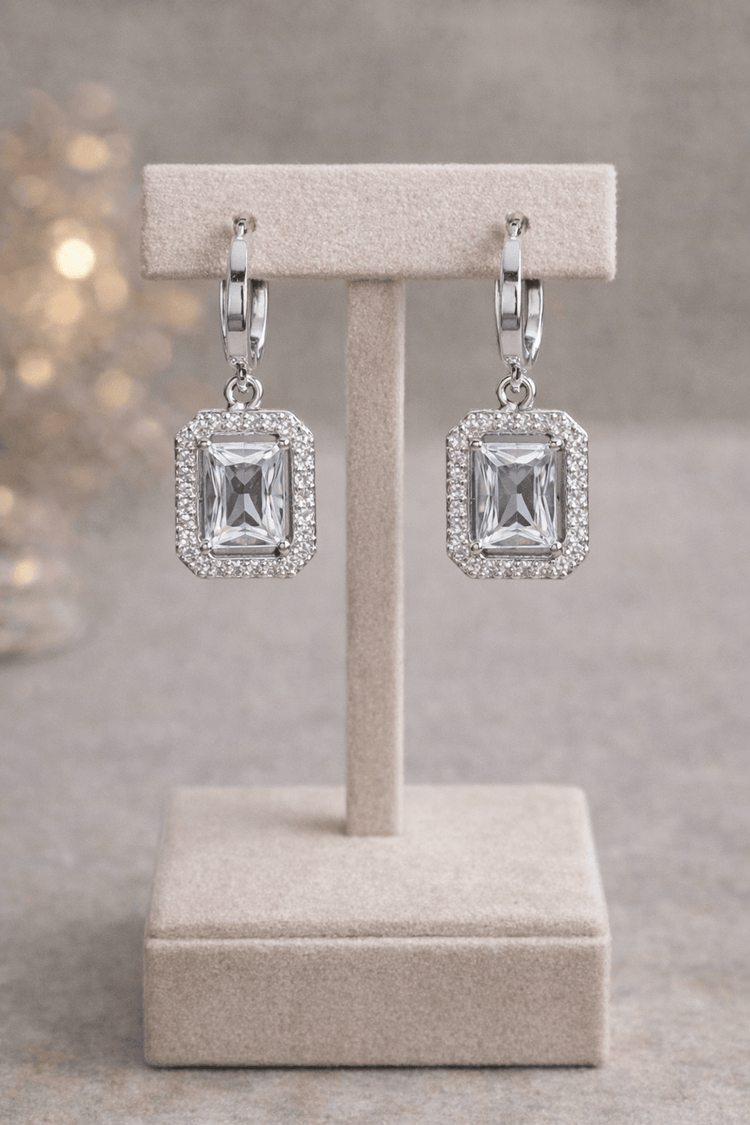 Elegant square-cut crystal drop earrings in silver with halo of small crystals