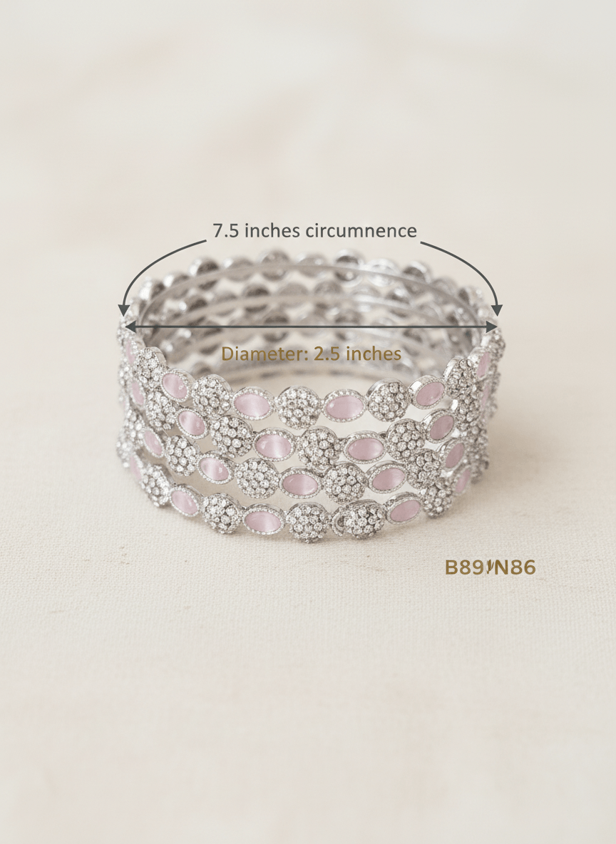 Silver bracelet with pink stones on a beige background, showing measurements and product code.