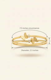 Gold bracelet with measurements on a beige background