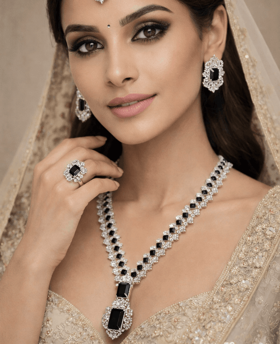 Woman wearing a luxurious diamond necklace, earrings, and ring with a beige outfit.