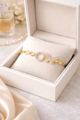 Gold bracelet with &