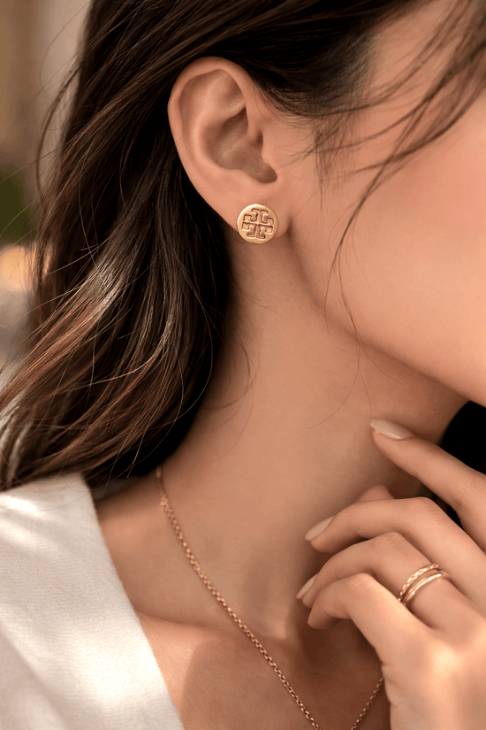Gold symbol stud earrings for women, minimal and elegant jewelry