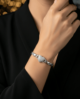 Silver bracelet on a person&