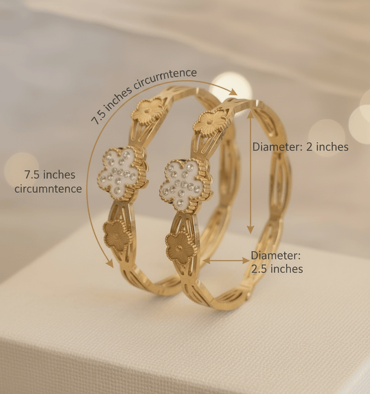 Gold hoop earrings with measurements on a neutral background