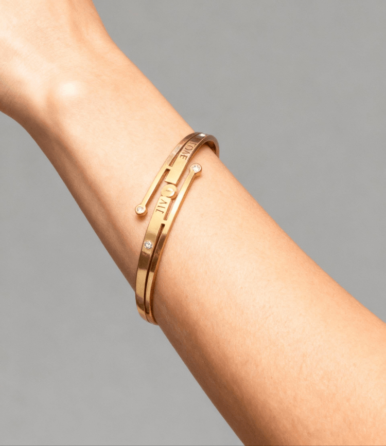 Gold bracelet on a person&