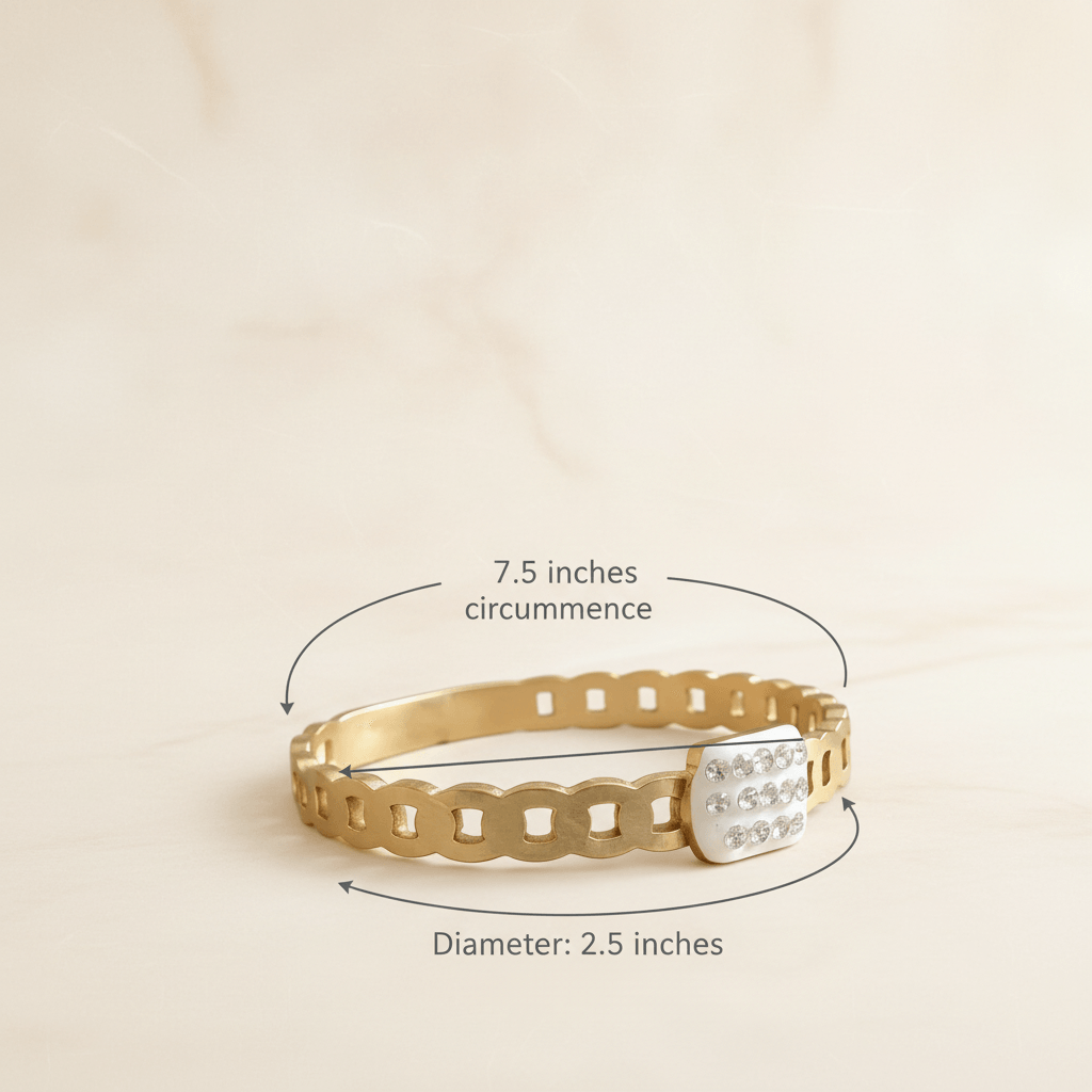 Gold bracelet with measurement details on a beige background