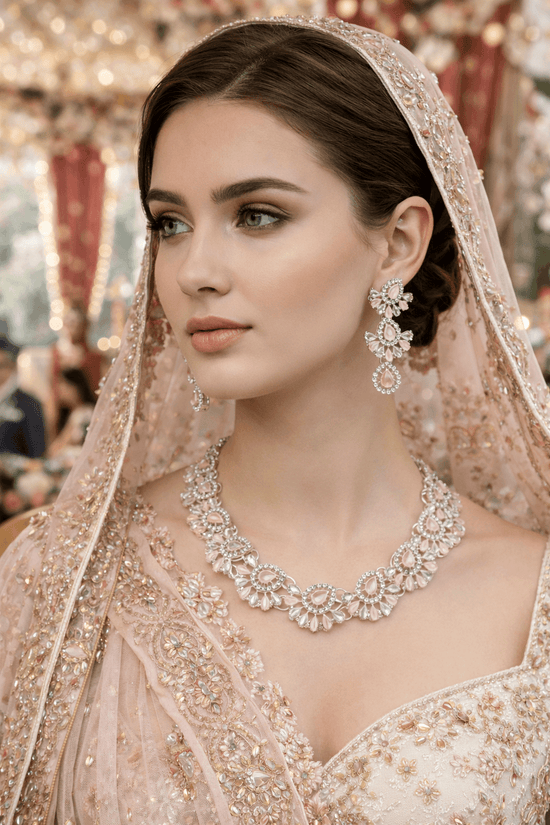 Woman in traditional attire with jewelry, set against a blurred festive background