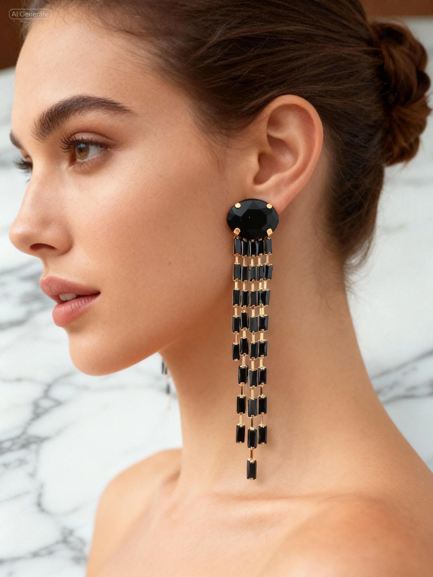 Woman wearing a black and gold earring with a marble background